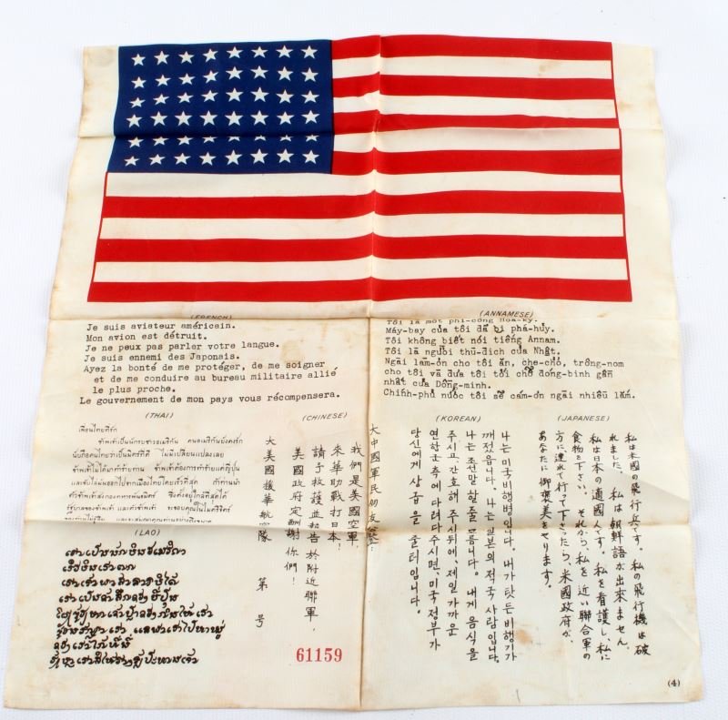 WWII MIS-X TYPE 4 CHIT 7 LANGUAGE 48 STAR FLAG: Original WWII-era 7 language blood chit, MIS-X type 4. Includes French, Annamese, Thai, Chinese, Korean, Japanese, and Lao. Features 48 star American flag on top. Printed on rayon. Serial number 61159