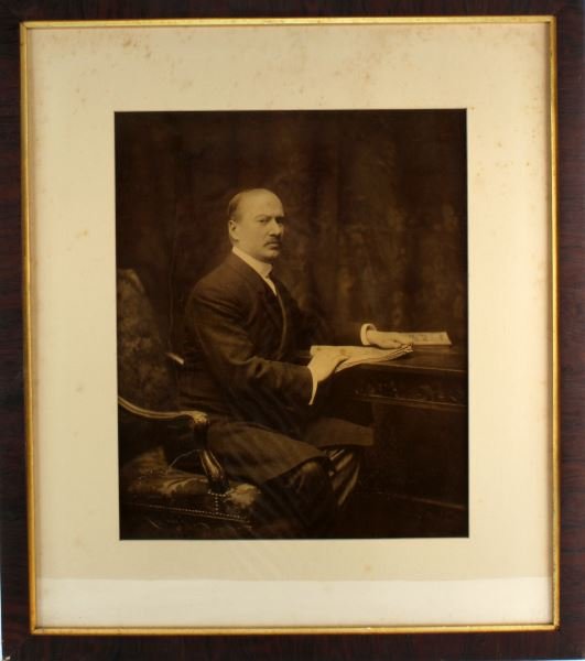 ALFRED I. DUPONT FRAMED PHOTOGRAPH ESTATE FIND: Black and white photograph of Alfred I. Dupont. Double framed measuring 33 by 29 inches. Evidence of storage, needs cleaning. Taped cardboard backing and written (M. Bed 17) indicating it hung in the