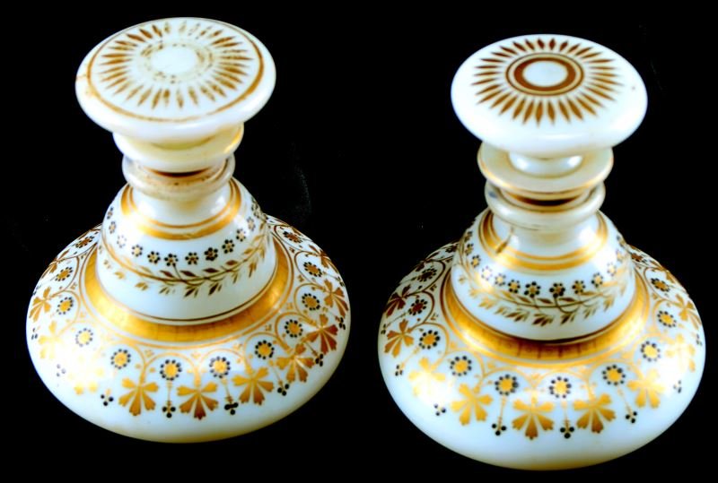 VICTORIAN VANITY BOTTLE HAND PAINTED SET DUPONT: Pair of hand painted vanity bottles, Victorian milk glass with golden floral designs. The hand blown bottles appear to be vanity or barber bottles. The pair has some wear to the golden paint, however 