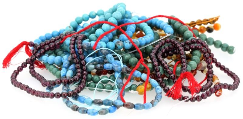 LOT OF 12 STRANDS OF GENUINE STONE BEADS TO STRING: Twelve strands of genuine stone beads, tiger eye, blue lace agate, garnet and others. All new; ready for you to strings and add clasp. Nothing larger than 6mm in diameter.