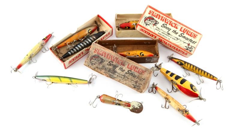 3 SMITHWICK BOXES WITH LURES & 6 SMITHWICK LURES: Three Smithwick boxes with lures and six other Smithwick lures. Expected signs of age and wear.