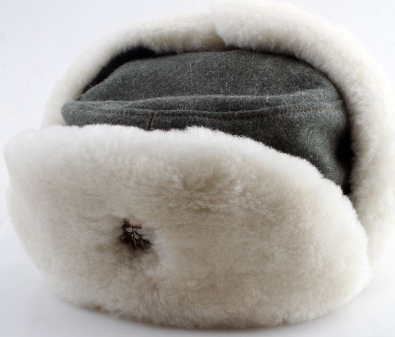 WWII THIRD REICH GERMAN SS WINTER HAT: WWII German SS winter hat. Has a totenkopf pin. "59" printed inside. Overall very good condition. Unauthenticated as is.