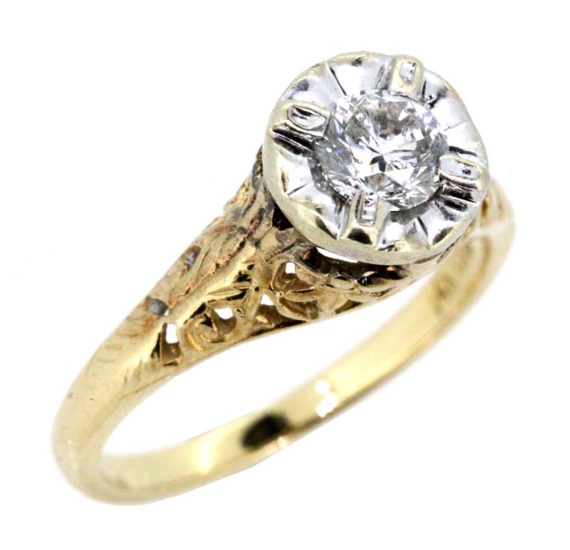 LADIES 14KT YELLOW GOLD DIAMOND FASHION RING: Modern ring with antique filigree design work, 14kt yellow gold, containing one round brilliant cut diamond weighing approximately .48 carats (light 1/2 carat)color graded H-I/ clarity graded SI2, wit