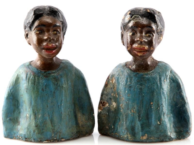 BLACK AMERICANA HAND MADE BOOKEND PAIR VINTAGE: Vintage plaster hand made black American bookends. The bookends depict the bust of a young girl in a blue gown. The girl gazes to the right of the viewer. While one bookend is in very good condition,