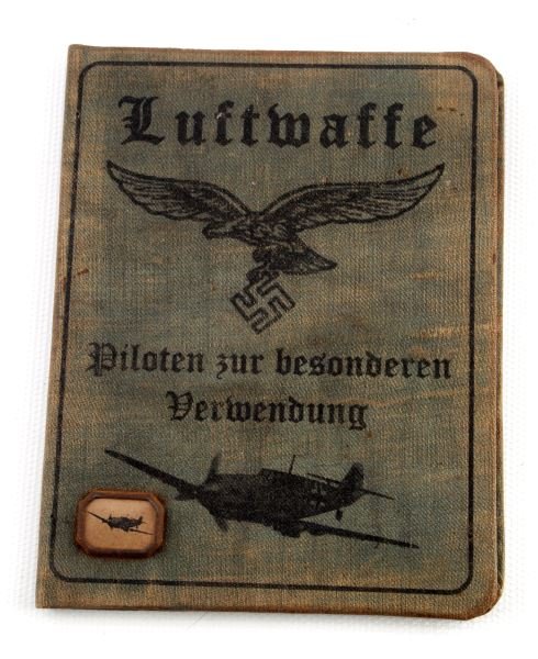 LUFTWAFFE PILOT ID BOOK WWII GERMAN THIRD REICH: WWII Third Reich Luftwaffe identification issued to Fritz Zimmerman. This small blue book, measures 5 inches by 4 inches, and appears to have the wear and patination of a 70 year old item. The fabric 