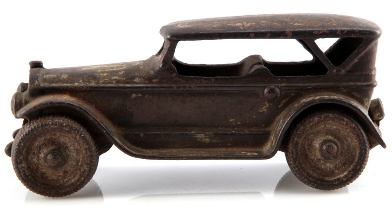 VINTAGE 1930'S CAST IRON LIMOSINE CAR: In very good condition for age, cast iron toy car, limousine, 6 1/2 inches long, 2 1/4 inches wide, solid wheels, paint marginal.