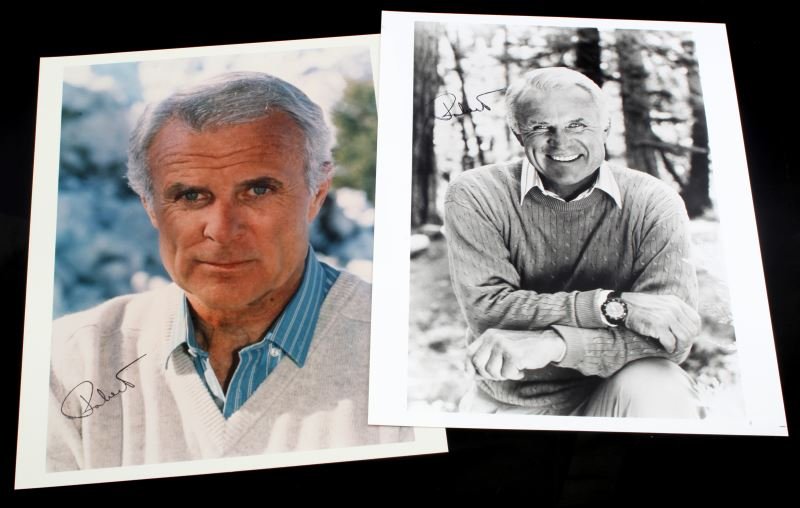 TWO ROBERT CONRAD AUTOGRAPHED 8 X 10 PHOTOS: One color photo and one black and white photo. Both signed with black marker. In very good condition. Robert Conrad is an American film and television actor, best known for his role in the 1965–1969