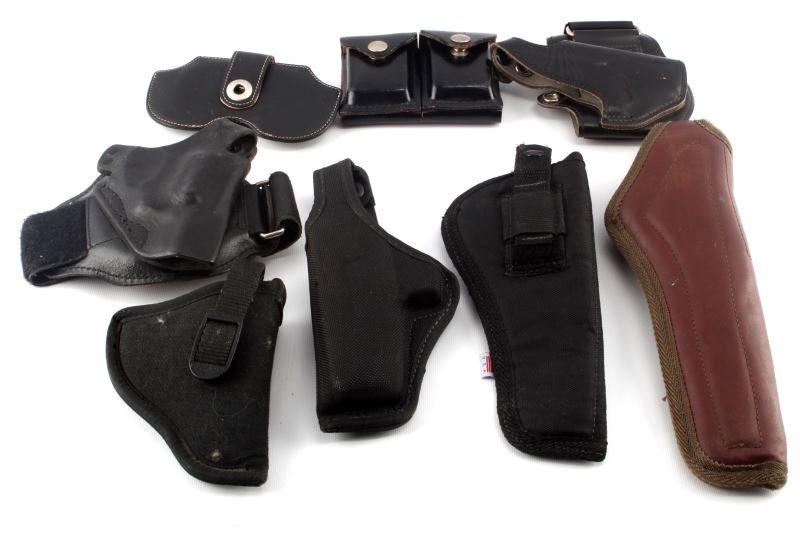 HOLSTERS AND FIREARM ACCESSORIES LOT: Modern concealed carry holsters, Bianchi nylon holster, ammo holster and more.