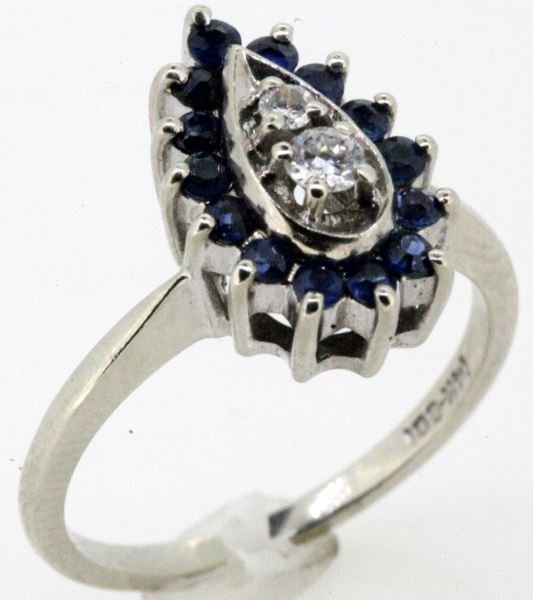 LADIES VINTAGE 14KT WHT GOLD SAPPHIRE/DIAMOND RING: Size 7, ladies fashion ring, 14kt white gold classic setting with pear shape top, two round full cut diamonds, 14 round medium blue sapphires (nice ones), with lot profile. In very good condition.