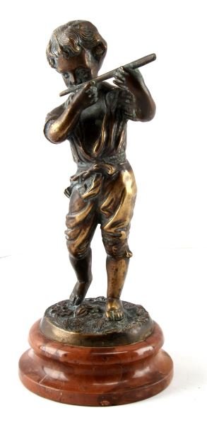 YOUNG FLUTE PLAYER VINTAGE BRONZE SCULPTURE: Vintage bronze sculpture on marble base. The statue depicts a young boy playing the flute. The sculpture measures 11 inches tall. Some corrosion but overall good condition. No apparent maker's mark or