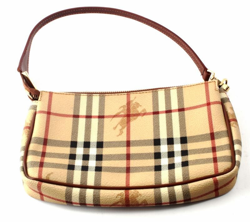 BURBERRY HAYMARKET POCHETTE CANVAS SMALL: Burberry canvas pochette with leather strap and golden hardware. Even stitches, no discoloration on hardware; very good condition. Measures 8 inches wide by 6 inches tall.