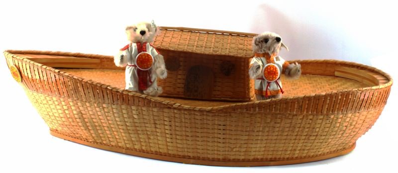 STEIFF WOVEN BOAT NOAHS ARK COLLECTION W NOAH: Steiff Noah's Ark with Mr & Mrs Noah set. Includes two mohair bears and woven boat. Made in Germany, by Steiff. Limited edition set of 8,000. Very good condition. Measures 29 inches long by 14 inches 