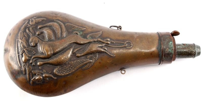 ORIGINAL BRASS POWDER HORN FLASK RELIEF DESIGN: Original brass powder horn / flask. Depicts leaping rabbit and quail or pheasant below. Measures 8 inches long. Very good condition.