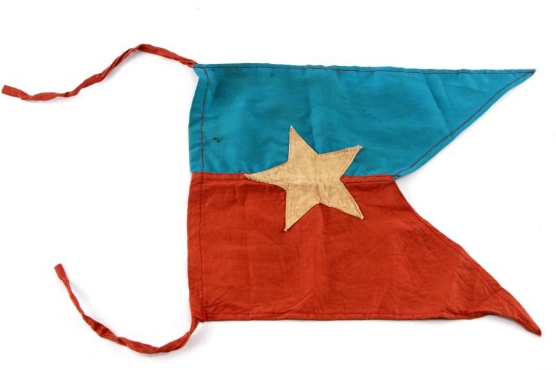 VIET KONG BATTLE FLAG BANNER SMALL BUGLE: Vietnam Era Viet Cong battle flag possibly for bugle . Measures 13 1/4" wide by 10 1/2" tall. Has a faded yellow star in the center with red and blue panels in the fields. Three piece machine sewn cot