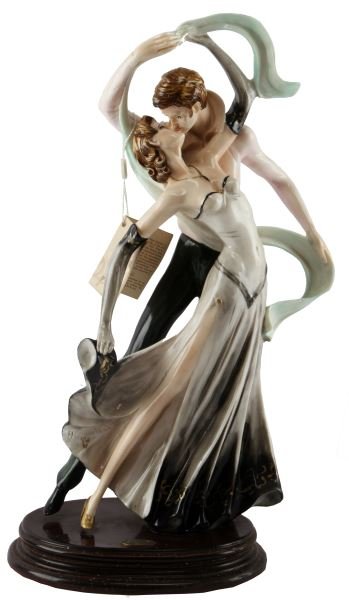 CAPODIAMONTE SANTINI LOVE DANCE PORCELAIN FIGURINE: Original Santini porcelain figurine, made in Italy. The work, titled "Love Dance", depicts a kissing couple dancing. The female's dress has the gold crown Capodiamonte emblem, and signed Santini. Meas
