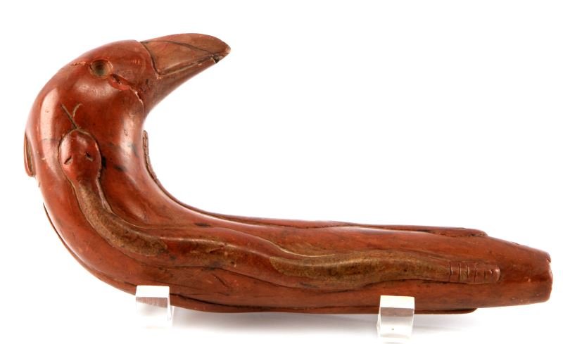 NATIVE AMERICAN BIRD EFFIGIY PIPESTONE PIPE: A 7.75 inch long effigy pipe in the form of a bird with rattlesnakes at it's sides. Half of the bird's head has been well repaired. Believed to have been found in Perry County, Tennessee.