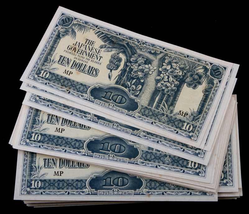 95 UNCIRCULATED WWII JAPANESE INVASION CURRENCY: Malaysia / Malaya invasion script, choice uncirculated.