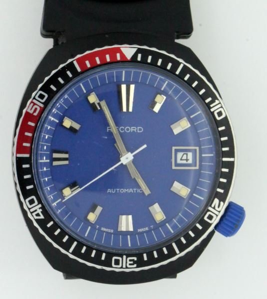 RECORD BY LONGINES MEN'S DIVER WATCH W/ DATE SWISS: An automatic Record diver's watch with date complication, circa early 1970s. Blue dial with domed crystal, bi-directional rotating bezel, raised steel hour markers, PVD coated stainless steel case wit