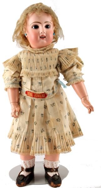 ANTIQUE FRENCH BEBE JUMEAU BISQUE DOLL 20'' TALL: Antique French Bebe Jumeau bisque doll with original clothing. She has short wavy blonde hair, pierced ears, glass eyes, and open mouth. Her clothes are slightly discolored, and the shows are worn, bu