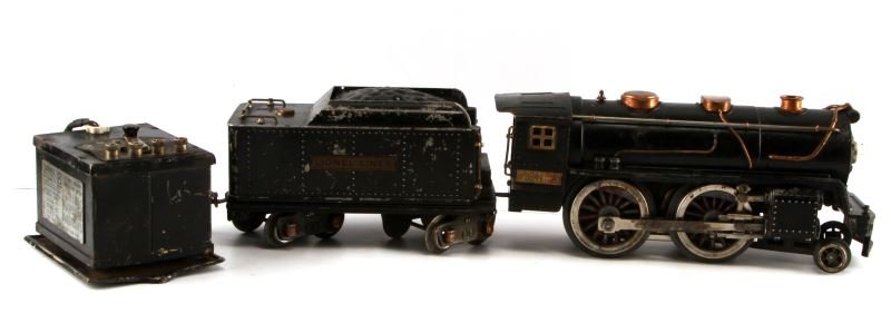 LIONEL TRAINS 384E 384T & MULTI VOLT TRANSFORMER: Pre-War Lionel train set. Includes: 384E (Bild-A-Loco), 384T tender, and Lionel Multi-volt transformer for alternating current only. Very good condition for age.