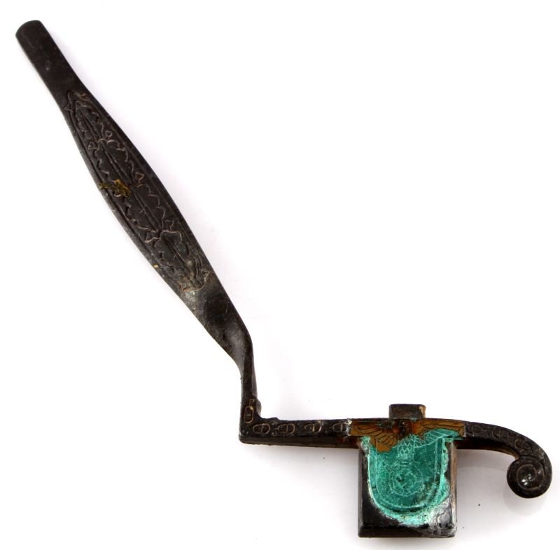 WWII GERMAN FACTORY MOLD SWORD CROSSGUARD: German factory mold for a Third Reich sword crossguard and backstrap. Rare item. The cross guard measures 4 inches wide. Open wing mold. No apparent maker's mark.