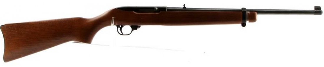 RUGER 10/22 CARBINE RIFLE WOOD STOCK .22 CALIBER: Ruger 10/22 Carbine rifle, .22 caliber. Smooth wood stock and blue steel. Front and rear sights. Bore is bright and clean. Overall very good. Requires an FFL for transfer.