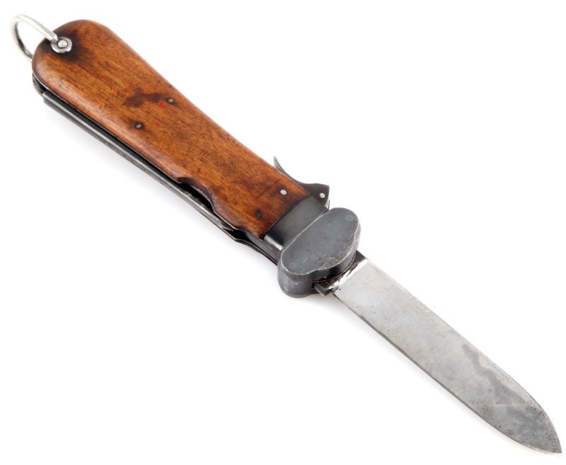 WWII GERMAN THIRD REICH LUFTWAFFE GRAVITY KNIFE: Third Reich paratrooper's gravity knife. Dual blade; one flat blade and marlin spike. Wooden grip in good condition with some darkening. Metal is unpolished and has a deep black patina. The crossguard