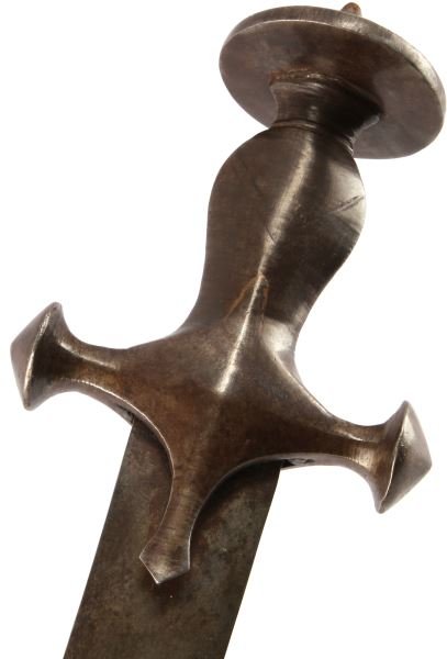 19TH CENTURY MIDDLE EASTERN PERSIAN SHARMIR SWORD: The sword's 30-inch blade and handle is in good condition with only some surface tarnish. The spine and one side of the blade have been inscribed.
