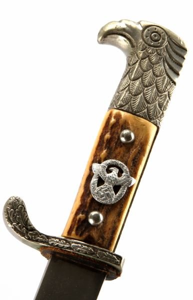 WWII THIRD REICH GERMAN POLICE BAYONET: A long police bayonet made by Paul Weyersburg. Stag horn grips, eagle head pommel, black scabbard and brown leather frog. Matching blade and scabbard numbers. In very good condition. This lot has a re