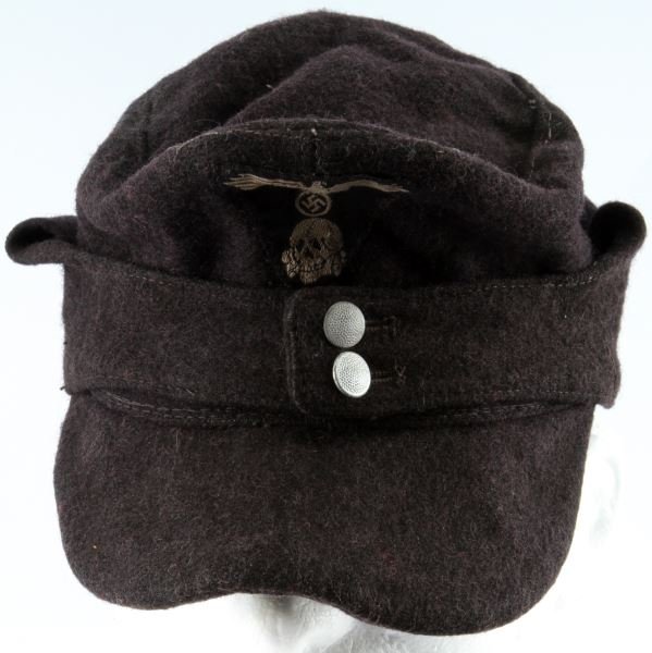 WWII THIRD REICH M43 SS FIELD CAP BLACK WOOL: An M 43 field cap in black. Has SS eagle and totenkopf insignia on front. Pebbled buttons match. Some fading but no holes, only minor stitching damage. Overall in very good condition. Small in size. P