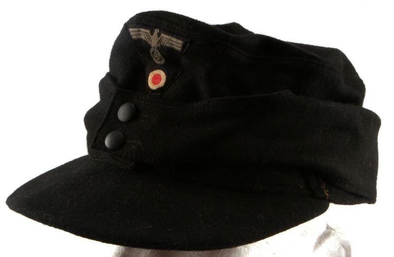 WWII THIRD REICH GERMAN PANZER M-43 CAP BLACK: A black M43 cap with eagle and cockade insignia. In very good condition, moth-free. . Passes blacklight testing.