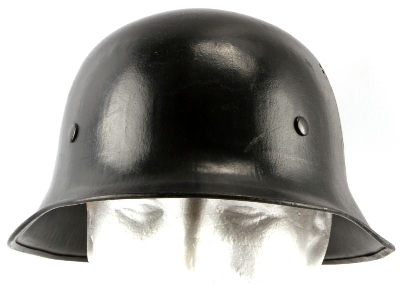 WWII GERMAN DOUBLE DECAL CIVIC POLICE HELMET: WWII German double decal civic police helmet. The helmet has two pressed vents on each side, a rolled edge, and 8 finger liner. The police decal is the bordered type. The shell has a light diamond sha