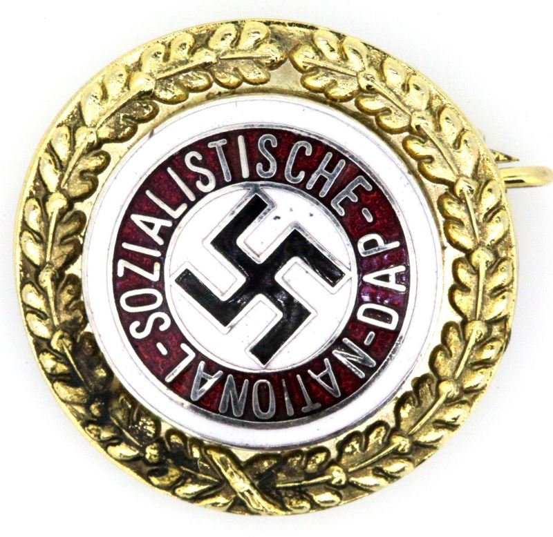 WWII THIRD REICH GOLD NSDAP POLITICAL PIN: WWII German gold NSDAP political pin. "NATIONAL SOZIALISTISCHE DAP" marked on face along with a swastika. "DESCHLER MUNCHEN 9" and "5474" etched into reverse side. Clasp functional. Overall very good