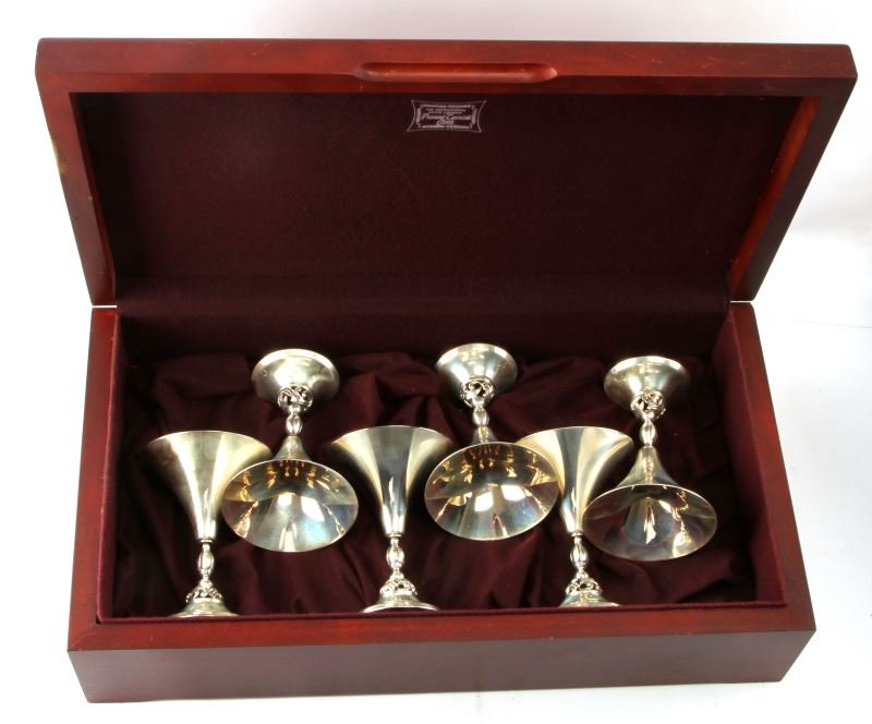 6 INTERNATIONAL STERLING SILVER MARTINI GOBLETS: Danish stylized set of six in a custom fitted mahogany wood box, each with a weight of 153.6 grams and standing 5 3/8 inches, as new, stunning set.