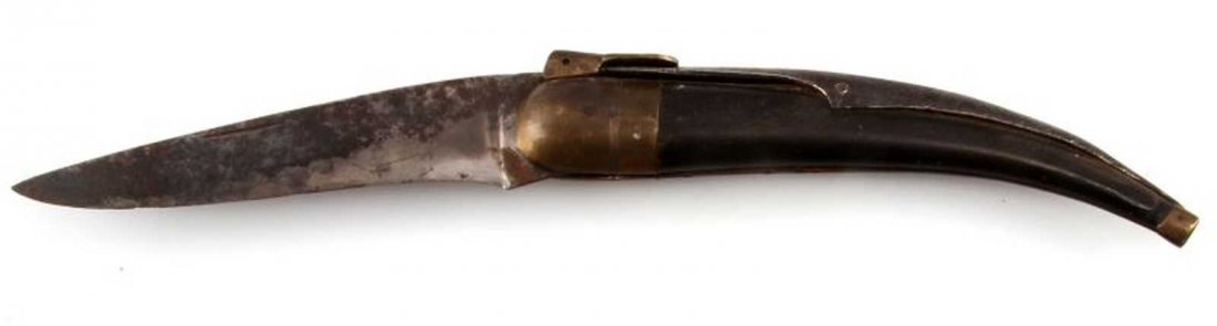 SPANISH RATCHET LOCKING NAVAJA FOLDING KNIFE: Antique Navaja with ratchet locking 4 inch blade. Dark wood handle and brass fittings. Some oxidation to blade and wear to handle.