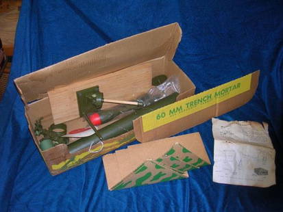VINTAGE TOY KUSAN 60MM TRENCH MORTAR BOXED & UNU: VINTAGE TOY KUSAN 60MM TRENCH MORTAR BOXED & UNUSED W INSTRUCTIONS ALL ITS PARTS THE BOX AND PAPER HAVING BEEN STORED IN AN ATTIC HAS A FEW MOISTURE STAINS KUSAN NASHVILLE TENN PRE 1962 SELLING IN