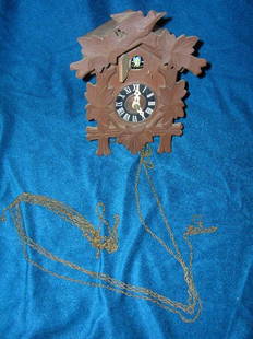 BLACK FOREST CUCKOO CLOCK MINUS WEIGHTS BUT SEEM: BLACK FOREST CUCKOO CLOCK MINUS WEIGHTS BUT SEEMS TO WORK CIRCA 40'S BLACK FOREST CUCKOO, NO DAMAGE TO WOOD ON CLOCK MEASURES 8 1/2 X 6 1/4" SELLING IN AN ON-SITE ESTATE SALE ON 12/3
