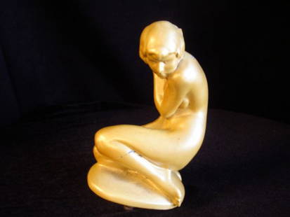 ANTIQUE ART DECO NUDE GIRL NUART NYC BOX ORNAMEN: BEAUTIFUL ANTIQUE ART DECO NUART NYC NUDE GIRL BOX ORNAMENT PEARLIZED GOLDEN ENAMELED METAL NUDE LADY ORNAMENT FOR MARBLETOP BOX MARKED NUART N.Y.C. BOX IS MISSING. STILL HAS MOUNTING SCREWS AND