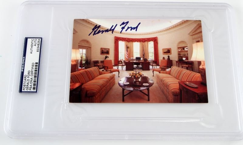 PHOTO AUTOGRAPHED BY GERALD R. FORD: Includes one 6x4 inch White House postcard, autographed by President Ford, signed in blue ink, authenticated and encapsulated by PSA/DNA.