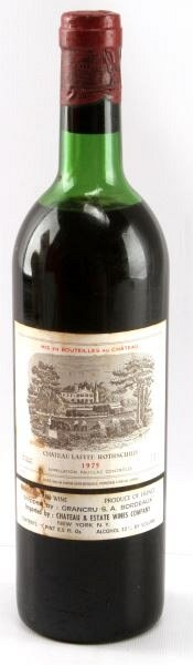 CHATEAU LAFITE-ROTHSCHILD RED BORDEAUX 1975 VTG: Vintage 1975 Chateau Lafite-Rothschild red Bordeaux blend. Label and seal still present. Top shoulder ullage. Cherry red color. Tight wax sealed cork. 3/4 quart.