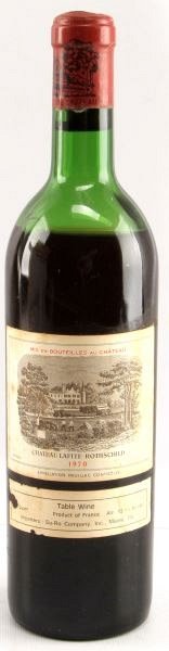 VINTAGE BORDEAUX 1970 LAFITE-ROTHSCHILD RED WINE: Vintage 1970 Chateau Lafite-Rothschild red Bordeaux blend. Label and seal still present. Low shoulder ullage. Cherry red color. Tight sealed cork. 3/4 quart.