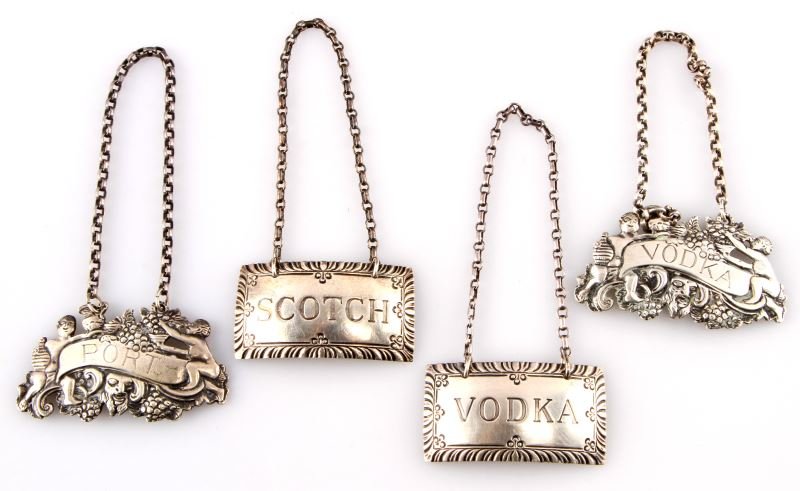 4 STERLING SILVER DECANTER LIQUOR LABELS: The Scotch and Vodka are Steiff Williamsburg, the port and Vodka is stamped sterling.