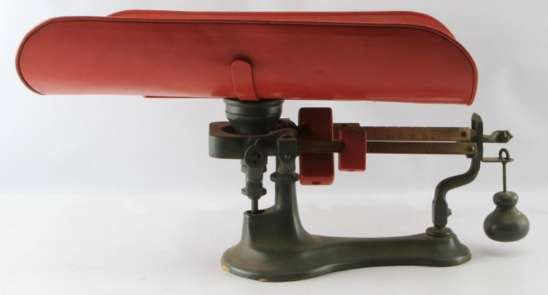 DETECT O-LETTE JUNIOR BABY SCALE JACOBS BROS CO: Vintage "Detect O-Lette Junior" baby scale with 25 lb maximum capacity. Complete red and green paint. No apparent rust. Very good condition. Measures 13 inches tall by 24 inches long.