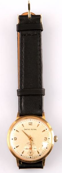 MENS VINTAGE "SMITHS ASTRAL" 17 JEWEL WRISTWATCH: 17 jewel stem wind and set movement, gold plated steel case, made in England by Smiths. Sweep second dial at 6 o;clock position. Astral model in very good running condition (no imp[lied warranty).Blac