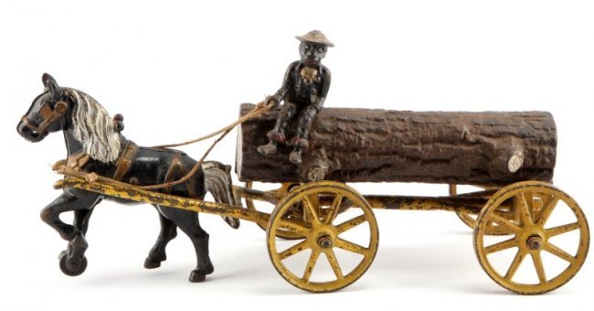 ANTIQUE CAST IRON KENTON TOYS LOG WAGON COMPLETE: Cast iron toy, four piece set made by Kenton Toys. Features a plantation worker seated on a removable cast log, able to mount on yellow spoke wheel frame wagon, drawn by one horse. 14 inches long, ori