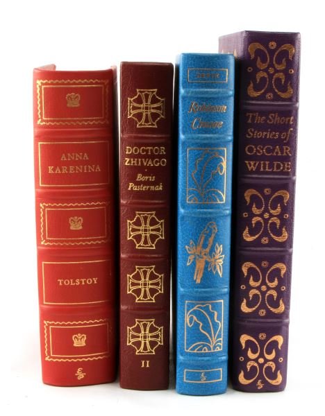 EASTON PRESS LEATHER BOUND CLASSIC BOOK LOT: Four Limited Edition Easton press classic book lot, it includes Doctor Zhivago volume II, Anna Karenina, The Short Stories of Oscar Wilde, and Robinson Crusoe.