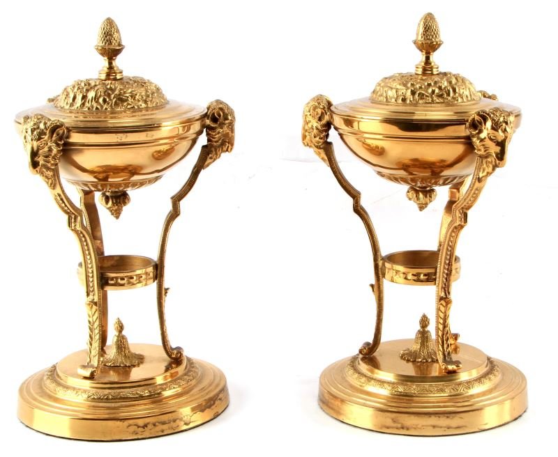 PAIR OF 11" BRASS CLASSICAL SACRIFICIAL TRIPODS: Two classical sacrificial tripods in brass, 11 inches tall. Both have removable lids. In good condition with some surface oxidation. With felt lined bottoms.