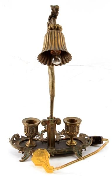 ART NOUVEAU BRASS CANDLE HOLDER ELECTRIC LAMP: An Art Nouveau style table lamp with candle holders. Takes a small bulb. Stands 12.5 inches tall. In good condition with some patina.