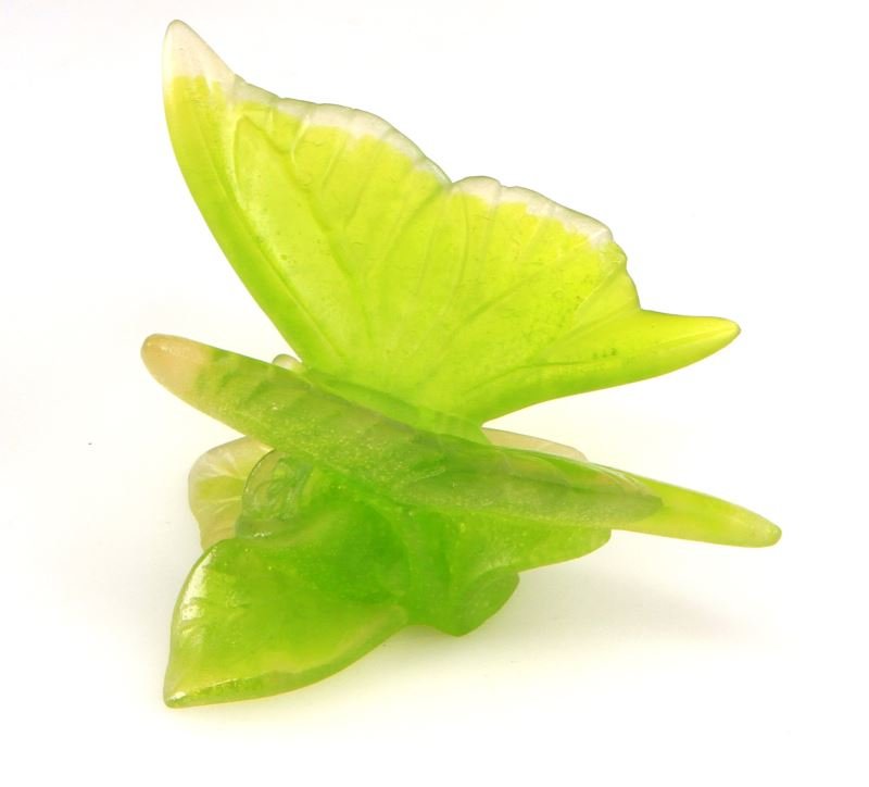 DAUM CRYSTAL BUTTERFLY LIME COLOR FRENCH: Daum crystal butterfly figurine in bright lime green color with clear edges around the wings. The base is signed "Daum France". Measures 2.5 inches tall. Very good condition; no chips, cracks, or repa