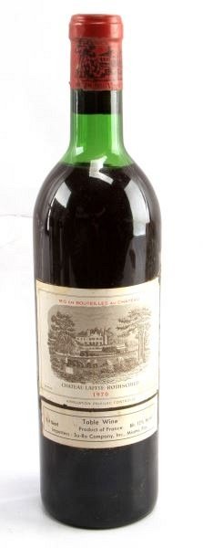 1970 BORDEAUX BLEND CHATEAU LAFITE ROTHSCHILD: Vintage 1970 Chateau Lafite-Rothschild red Bordeaux blend. Label and seal still present. Top shoulder ullage. Cherry red color. The label has some damage, but overall very good condition. Tight sealed